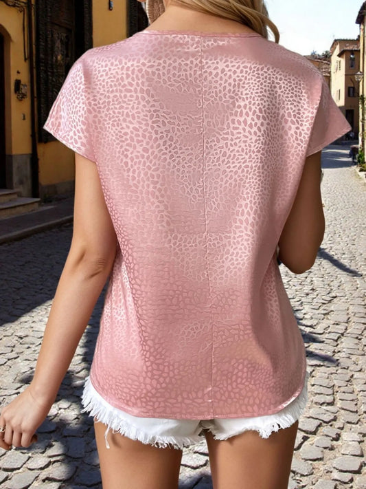 Blusa de manga corta con muescas y estampado animal