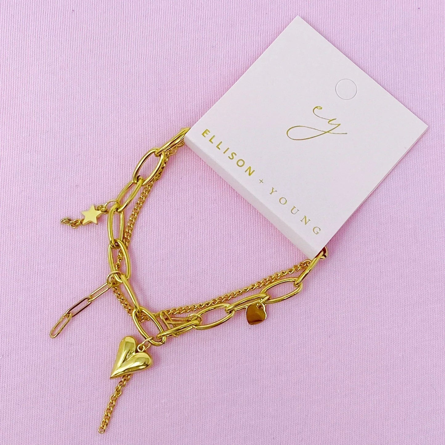 Pulsera con dijes de doble diversión