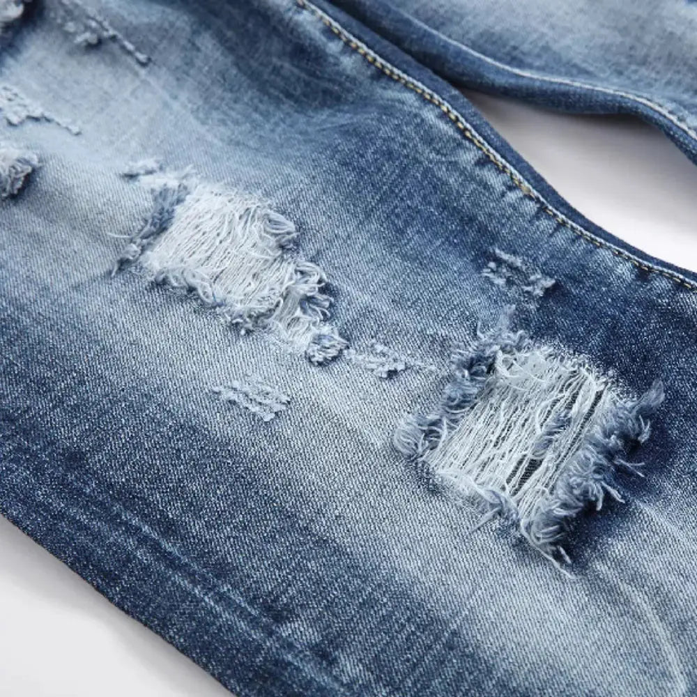 男士時尚破洞緊身牛仔褲