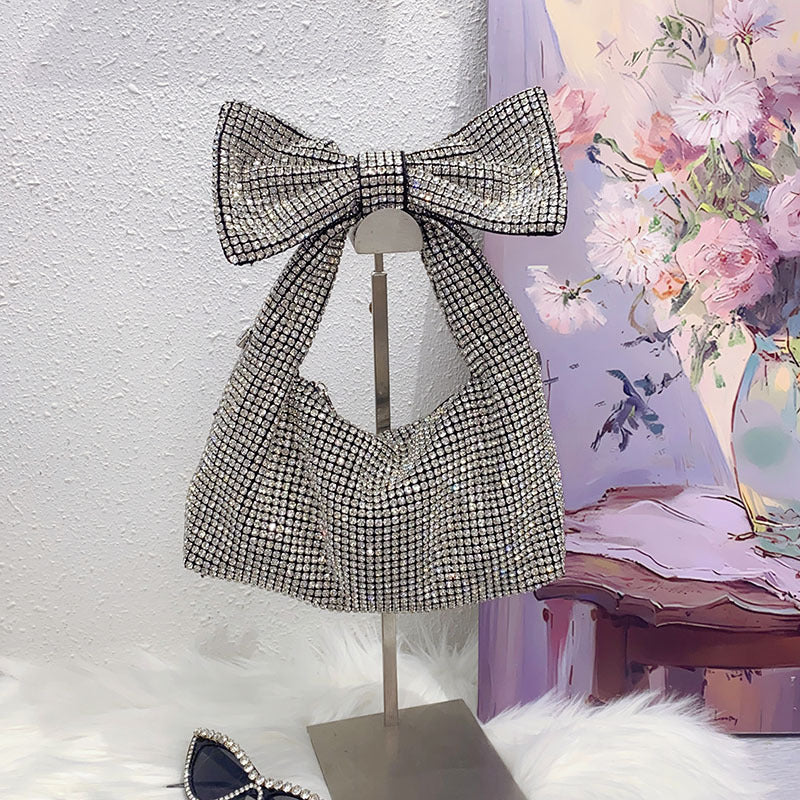 Bolso de hombro elegante con lazo y diamantes brillantes de imitación para la axila. 