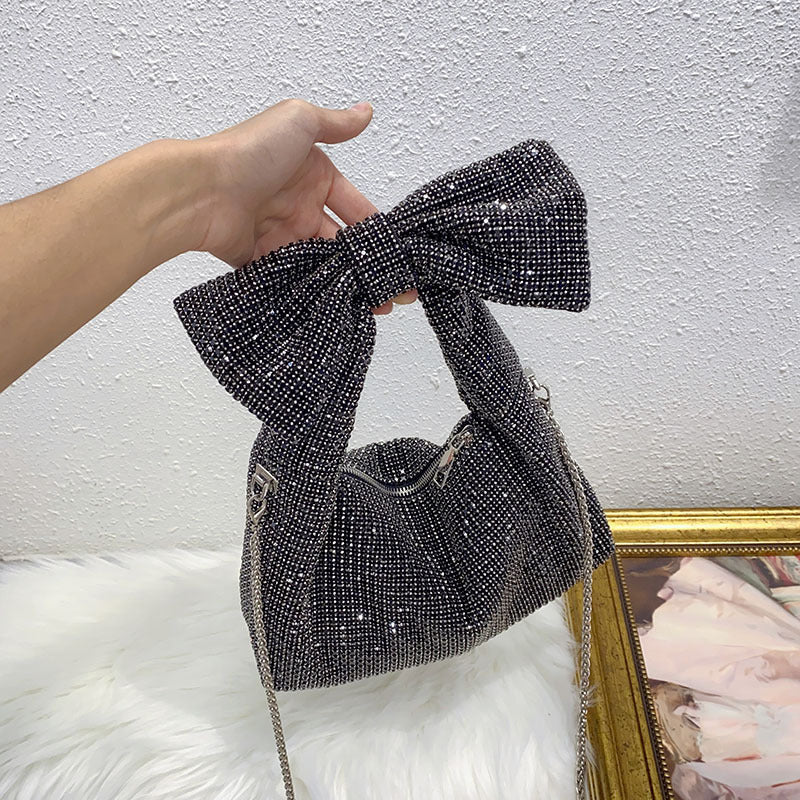 Bolso de hombro elegante con lazo y diamantes brillantes de imitación para la axila. 