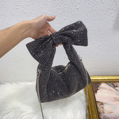 Bolso de hombro elegante con lazo y diamantes brillantes de imitación para la axila. 