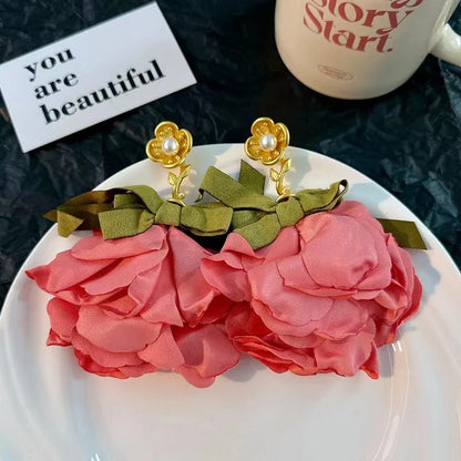 Pendientes largos con borlas de algodón hechos a mano