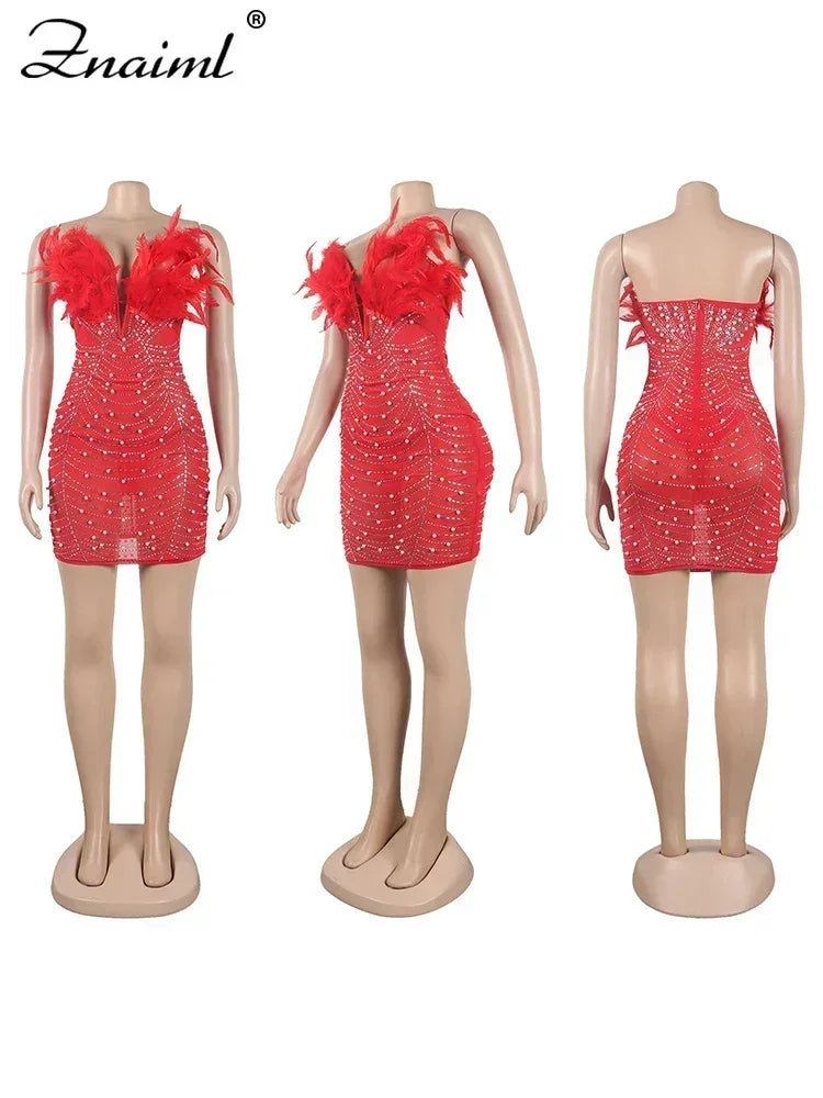 Vestido transparente con diamantes de imitación y plumas sexys de Znaiml