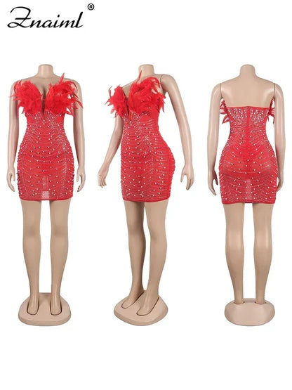 Vestido transparente con diamantes de imitación y plumas sexys de Znaiml