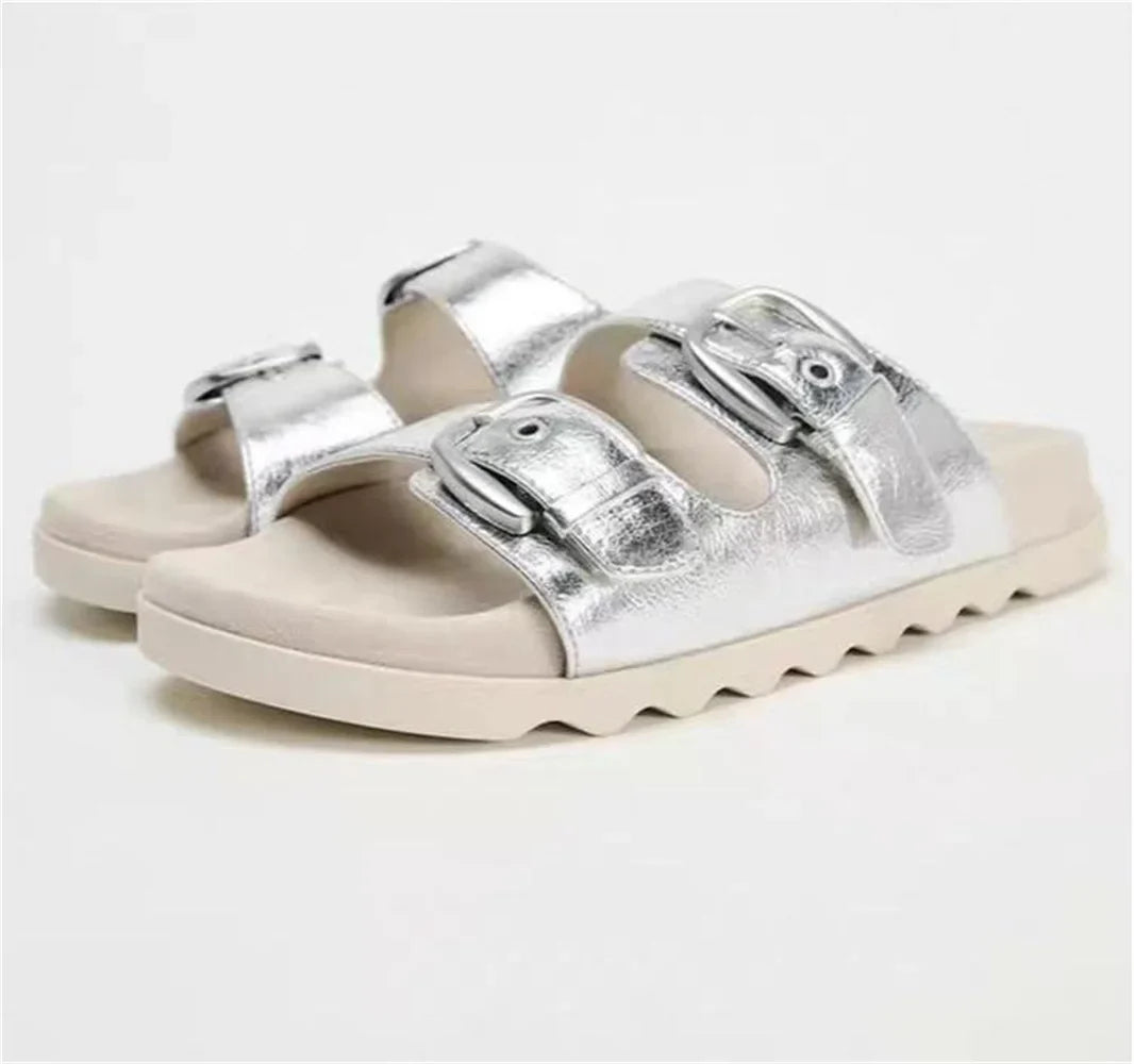 Sandalias planas elegantes de diseñador para mujer