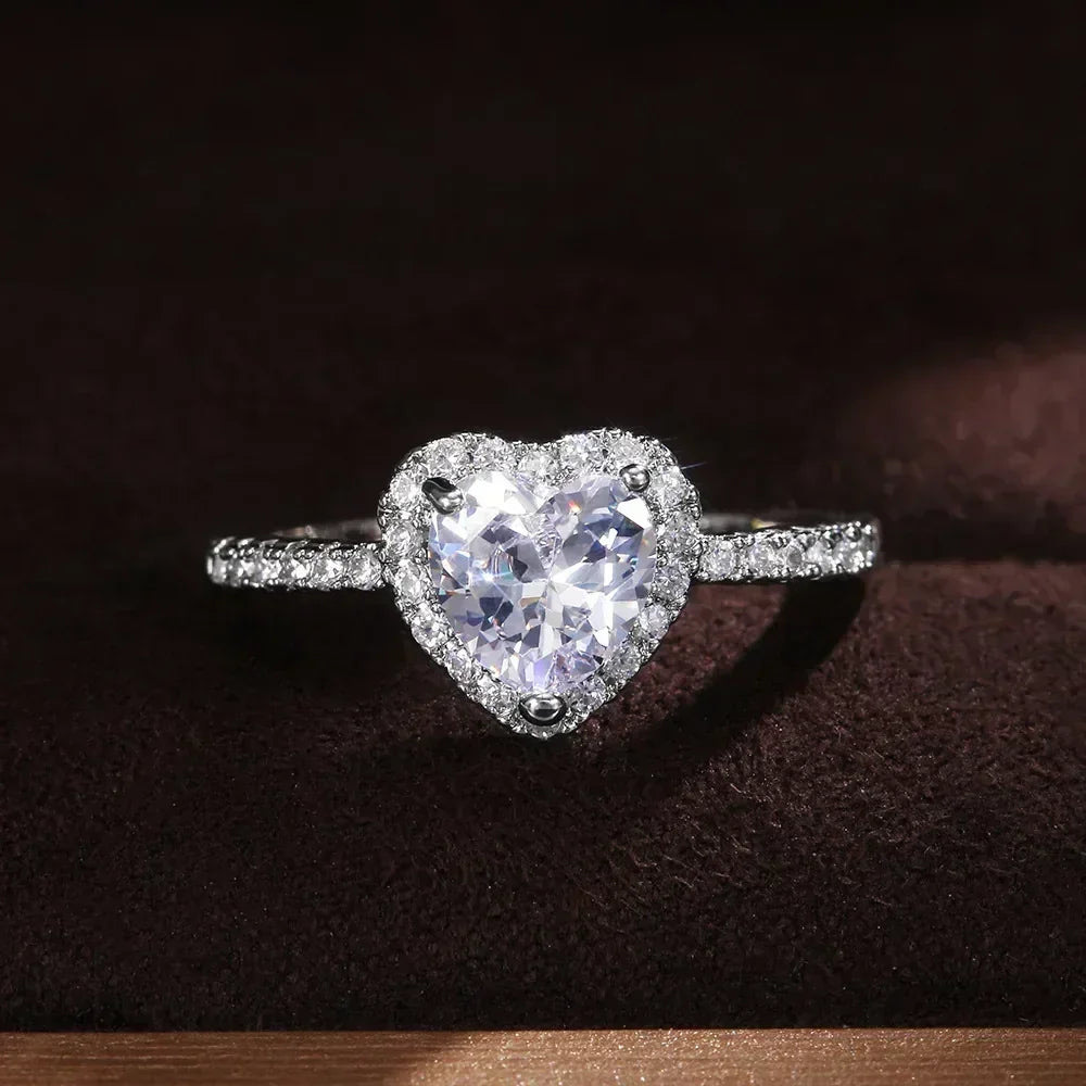 Anillo de corazón de melocotón europeo y americano para mujer, personalizado, con forma de corazón, circón con incrustaciones de diamantes, joyería de moda al por mayor, 2025