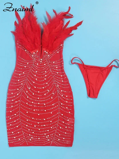 Vestido transparente con diamantes de imitación y plumas sexys de Znaiml