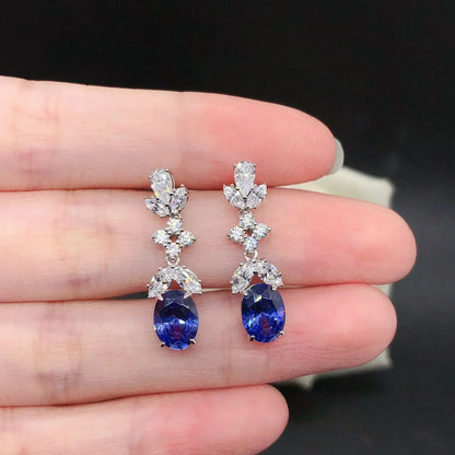 Pendientes colgantes para mujer con corte marquesa y pavé ovalado de moissanita de 1,5 ct y platino PT950. Elaborados en platino PT950 con doble forma: marquesa y ovalada.