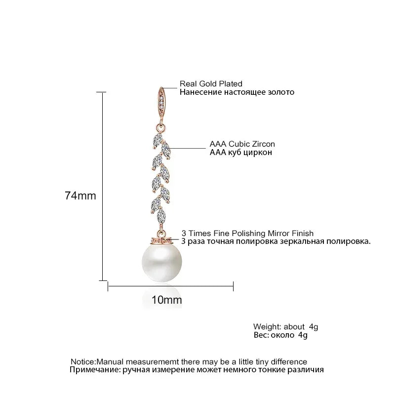 Pendientes colgantes de perlas de imitación redondas ZAKOL para mujer, con circonitas brillantes y hojas de cristal, largos, para novia, joyería de boda
