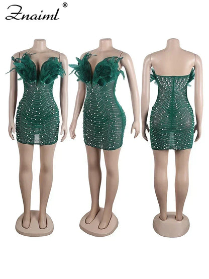 Vestido transparente con diamantes de imitación y plumas sexys de Znaiml