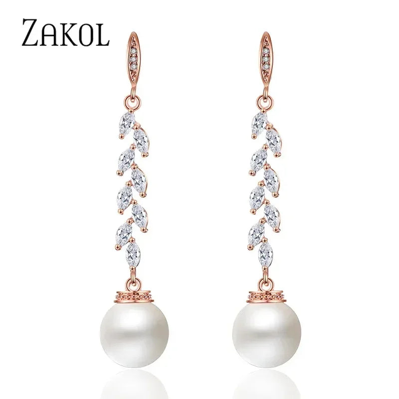 Pendientes colgantes de perlas de imitación redondas ZAKOL para mujer, con circonitas brillantes y hojas de cristal, largos, para novia, joyería de boda