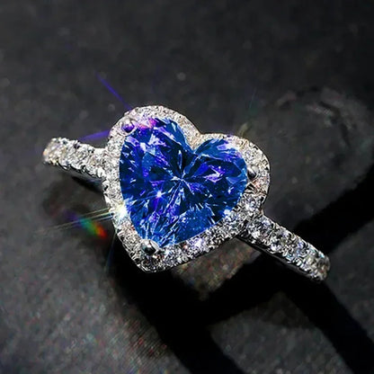 Anillo de corazón de melocotón europeo y americano para mujer, personalizado, con forma de corazón, circón con incrustaciones de diamantes, joyería de moda al por mayor, 2025