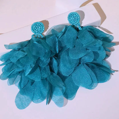 Pendientes largos con borlas de algodón hechos a mano