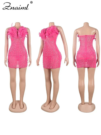Vestido transparente con diamantes de imitación y plumas sexys de Znaiml