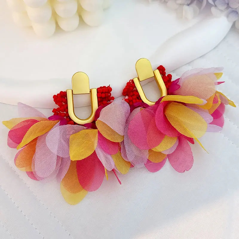 Pendientes largos con borlas de algodón hechos a mano