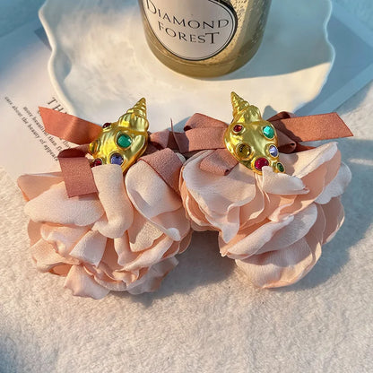 Pendientes largos con borlas de algodón hechos a mano