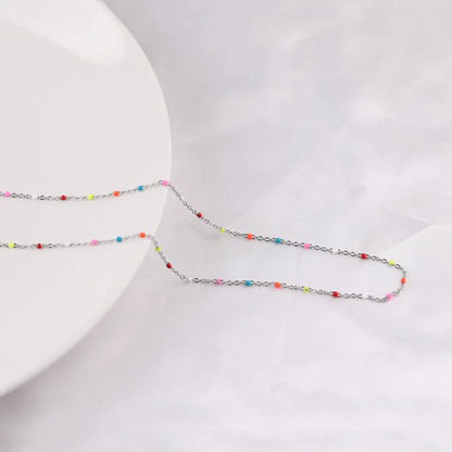 Collar con nombre y corazón de mariposa personalizado