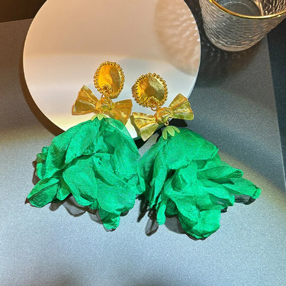 Pendientes largos con borlas de algodón hechos a mano