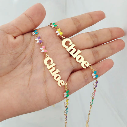 Collar con nombre y corazón de mariposa personalizado