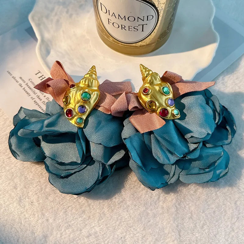 Pendientes largos con borlas de algodón hechos a mano