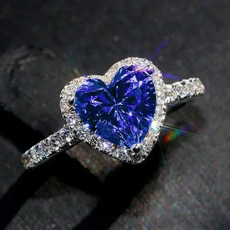 Anillo de corazón de melocotón europeo y americano para mujer, personalizado, con forma de corazón, circón con incrustaciones de diamantes, joyería de moda al por mayor, 2025