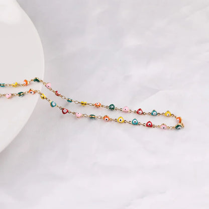 Collar con nombre y corazón de mariposa personalizado