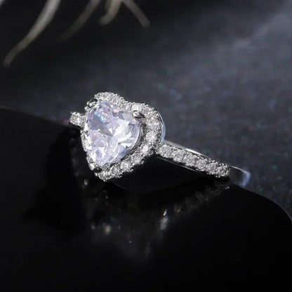 Anillo de corazón de melocotón europeo y americano para mujer, personalizado, con forma de corazón, circón con incrustaciones de diamantes, joyería de moda al por mayor, 2025