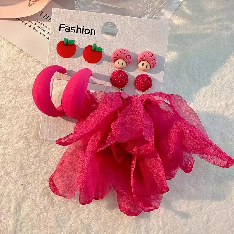 Pendientes largos con borlas de algodón hechos a mano