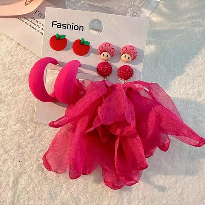 Pendientes largos con borlas de algodón hechos a mano