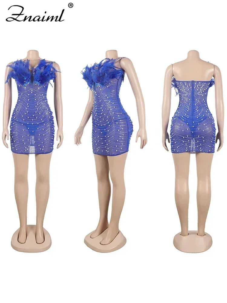 Vestido transparente con diamantes de imitación y plumas sexys de Znaiml