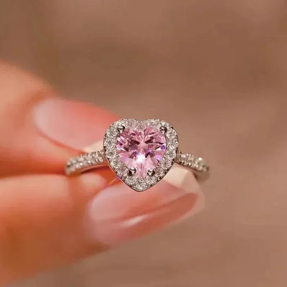 Anillo de corazón de melocotón europeo y americano para mujer, personalizado, con forma de corazón, circón con incrustaciones de diamantes, joyería de moda al por mayor, 2025