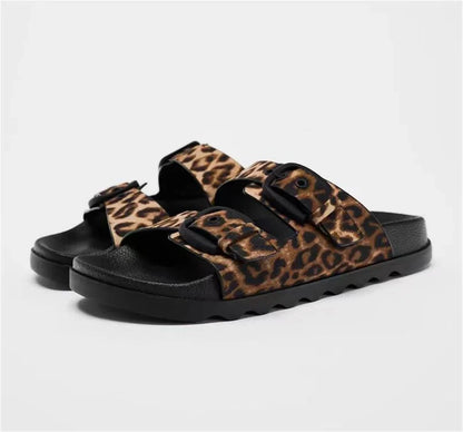 Sandalias planas elegantes de diseñador para mujer