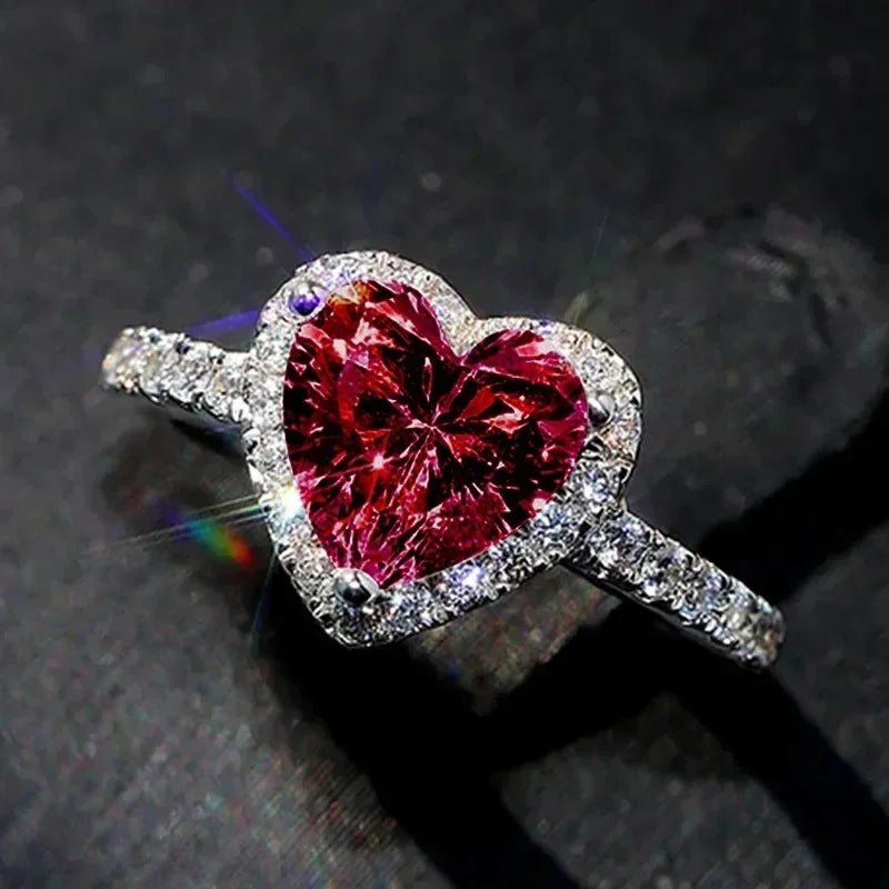 Anillo de corazón de melocotón europeo y americano para mujer, personalizado, con forma de corazón, circón con incrustaciones de diamantes, joyería de moda al por mayor, 2025