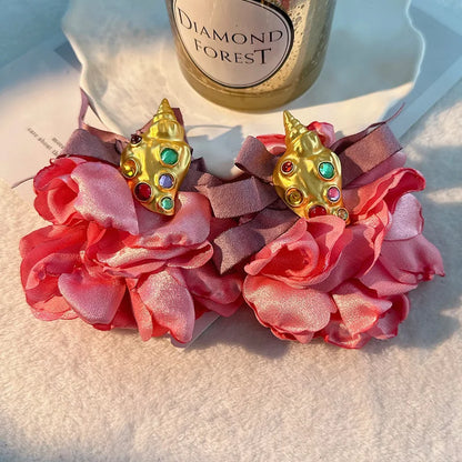 Pendientes largos con borlas de algodón hechos a mano