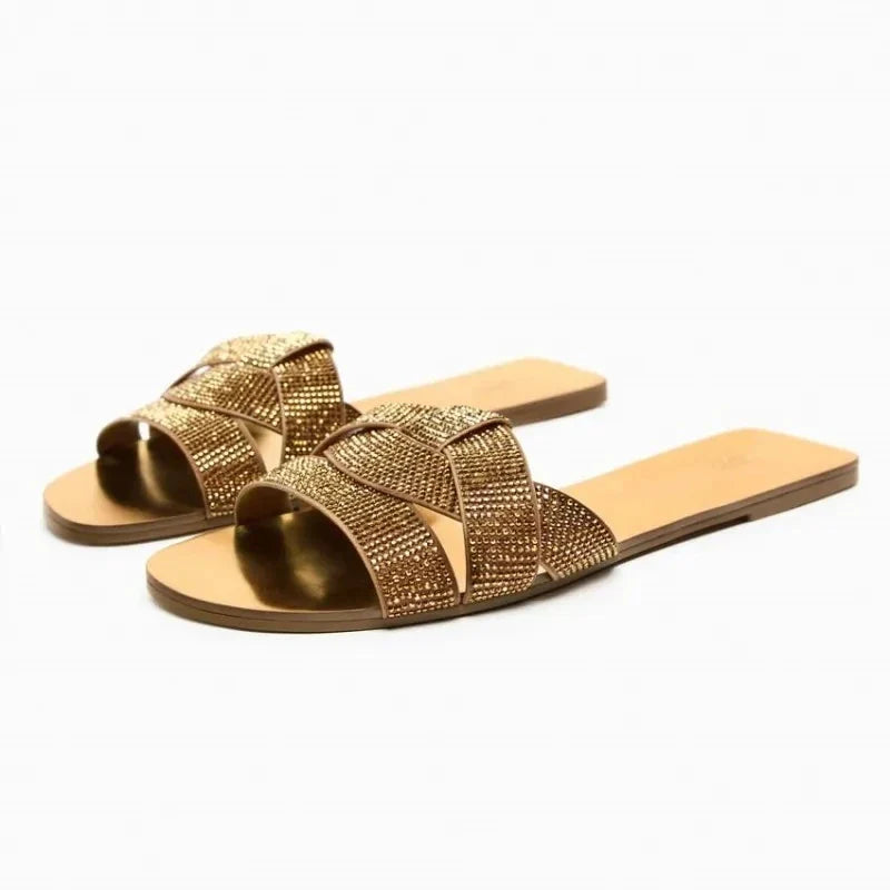 Sandalias planas elegantes de diseñador para mujer