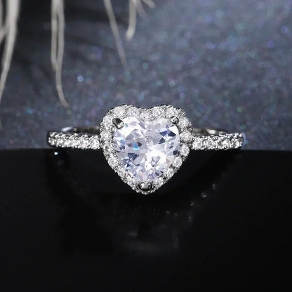 Anillo de corazón de melocotón europeo y americano para mujer, personalizado, con forma de corazón, circón con incrustaciones de diamantes, joyería de moda al por mayor, 2025