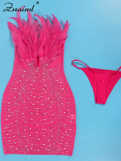 Vestido transparente con diamantes de imitación y plumas sexys de Znaiml