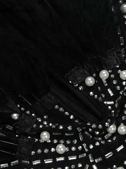 Vestido transparente con diamantes de imitación y plumas sexys de Znaiml