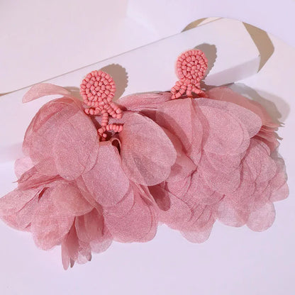 Pendientes largos con borlas de algodón hechos a mano