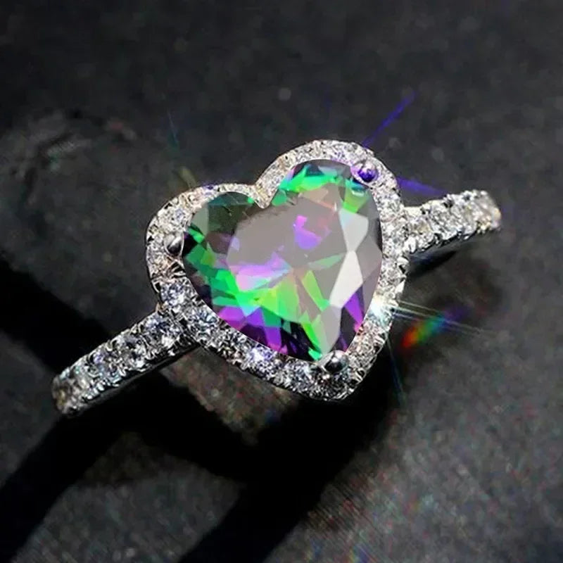 Anillo de corazón de melocotón europeo y americano para mujer, personalizado, con forma de corazón, circón con incrustaciones de diamantes, joyería de moda al por mayor, 2025