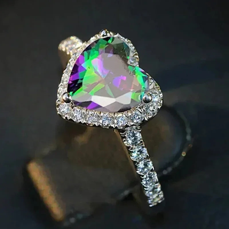 Anillo de corazón de melocotón europeo y americano para mujer, personalizado, con forma de corazón, circón con incrustaciones de diamantes, joyería de moda al por mayor, 2025