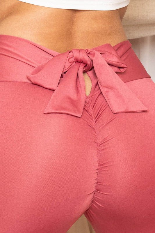 Leggings deportivos con lazo en la cintura y lazo en la espalda