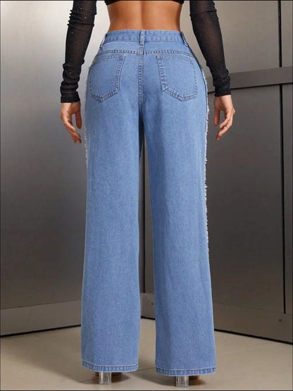 Vaqueros desgastados de pierna ancha