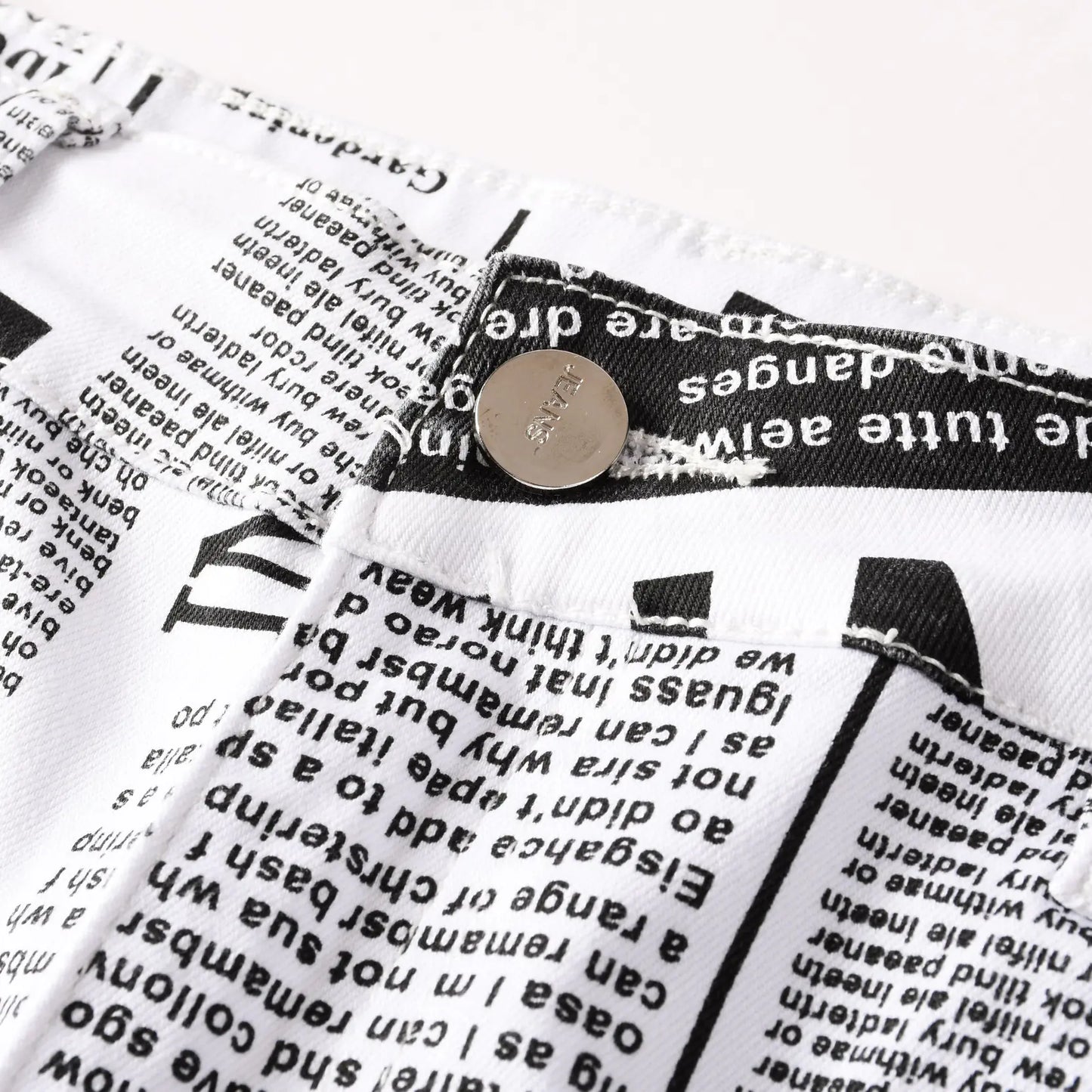 男士時尚不對稱印花牛仔褲